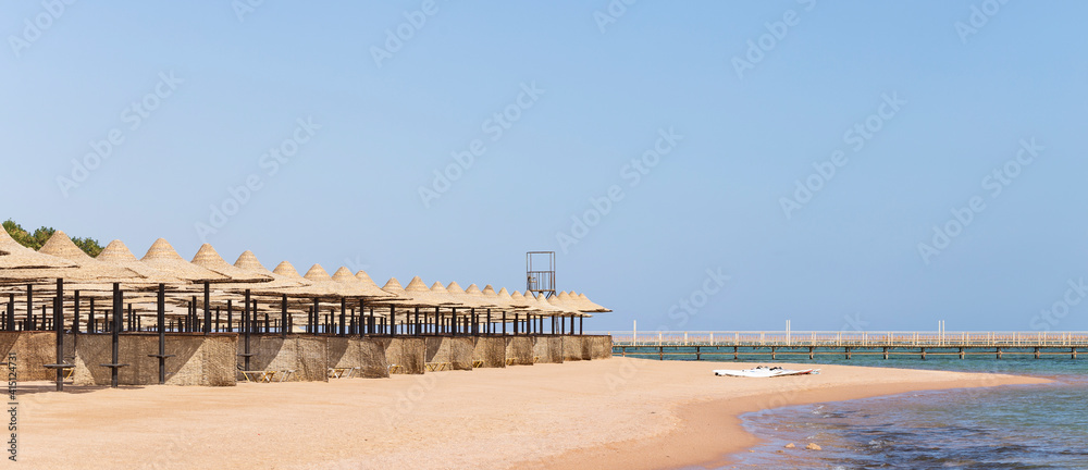 An empty beach in Egypt during the COVID 19 pandemic. The Red Sea coast, a recreation area without people.