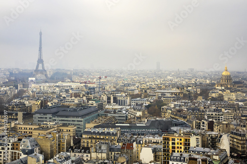 Aerial view of Paris on a foggy day. France. © dbrnjhrj