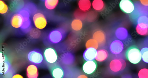 Colored bokeh abstract background. Decoration at Christmas holiday.