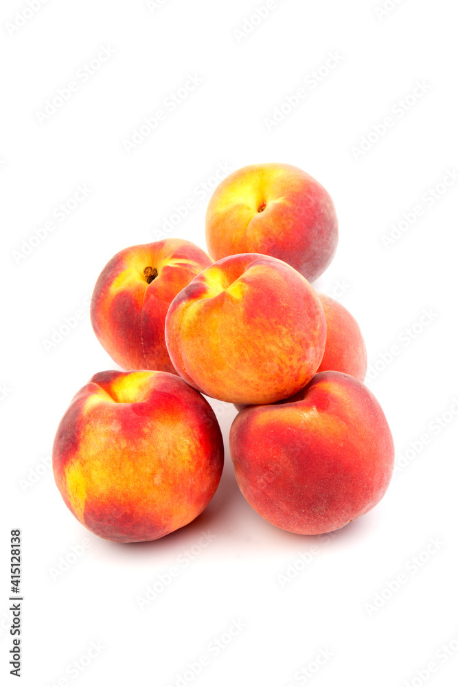 Summer fruit background. Ripe juicy peaches on white background. Copy space. Fresh organic fruit vegan food. Harvest concept Summer fruit background. Ripe juicy peaches on white background. Copy space. Fresh organic fruit vegan food. Harvest concept