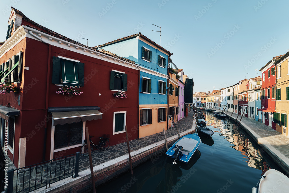 Bright colorful houses and buildings in Burano - streets of venice