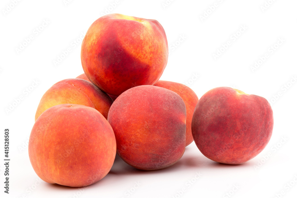 Summer fruit background. Ripe juicy peaches on white background. Copy space. Fresh organic fruit vegan food. Harvest concept Summer fruit background. Ripe juicy peaches on white background. Copy space. Fresh organic fruit vegan food. Harvest concept