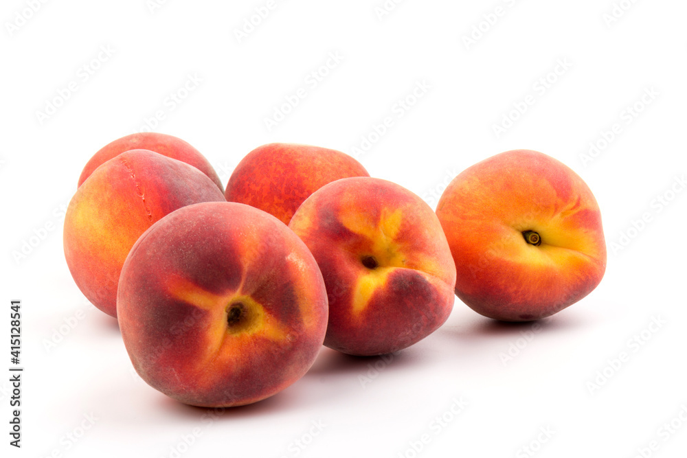 Summer fruit background. Ripe juicy peaches on white background. Copy space. Fresh organic fruit vegan food. Harvest concept Summer fruit background. Ripe juicy peaches on white background. Copy space. Fresh organic fruit vegan food. Harvest concept