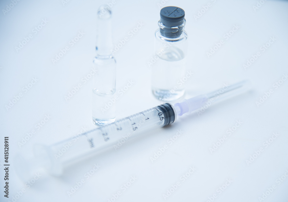 Liquid in bottle vaccine covid-19 concept. Liquid in bottle vaccine covid-19 concept.