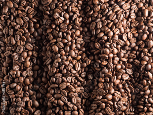Macro photo of roasted arabica coffee beans.