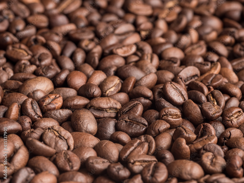 Macro photo of roasted arabica coffee beans. Macro photo of roasted arabica coffee beans.
