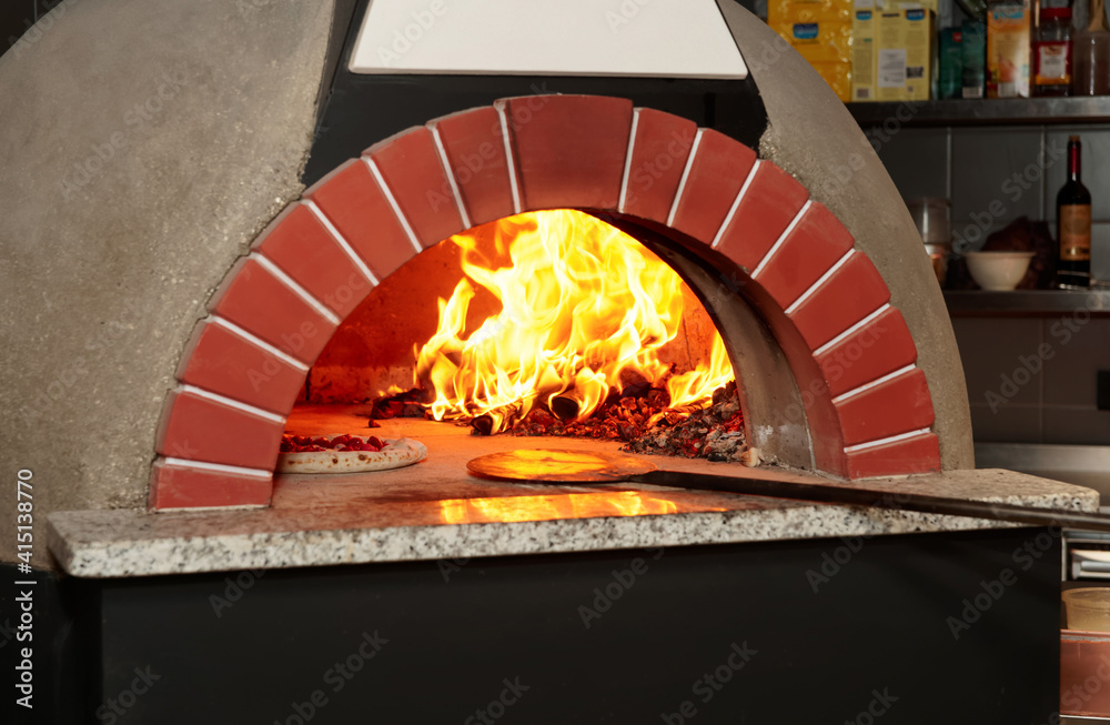 Integraal elegant Alarmerend Italian wood-fired pizza oven Stock Photo | Adobe Stock