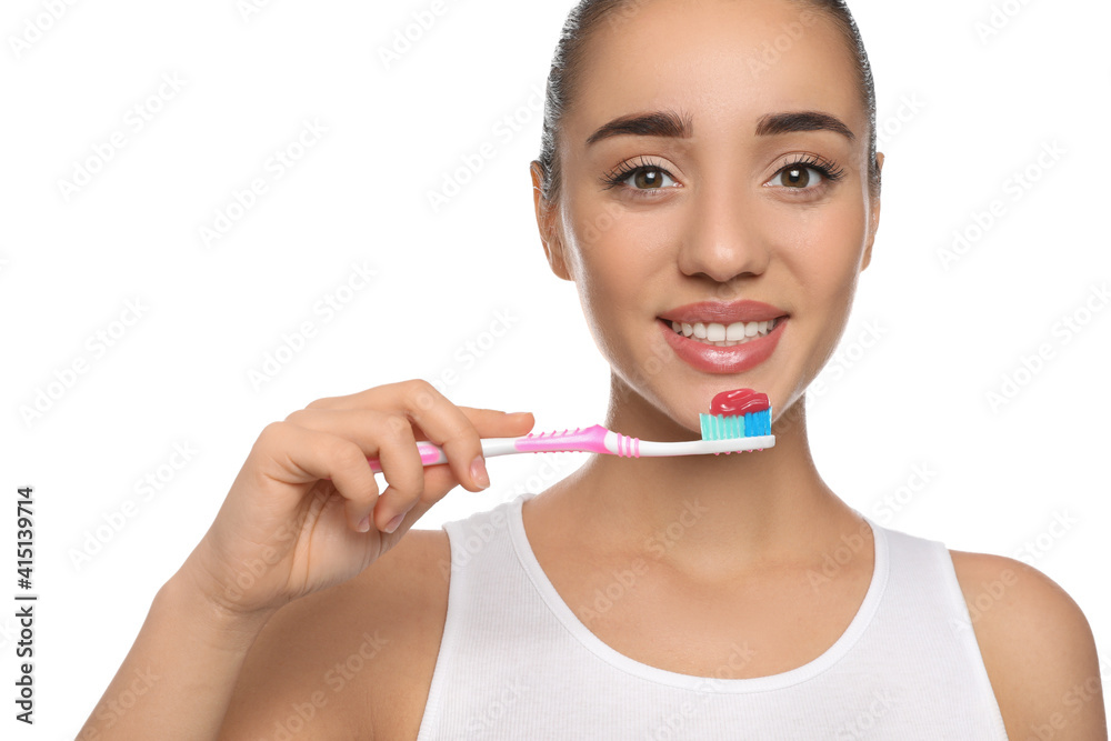 Woman holding toothbrush with paste on white background Woman holding toothbrush with paste on white background