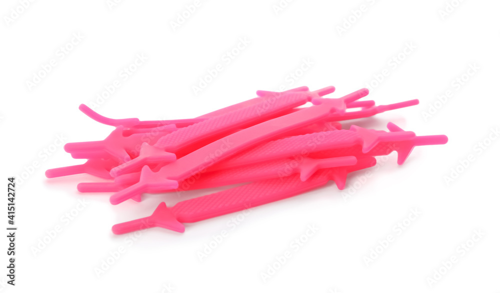 Pink silicone shoe laces on white background Pink silicone shoe laces on white background