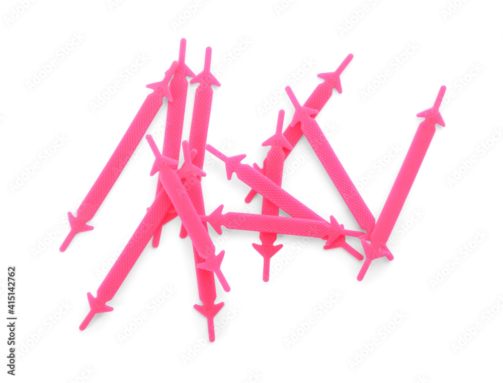 Pink silicone shoe laces on white background, top view Pink silicone shoe laces on white background, top view