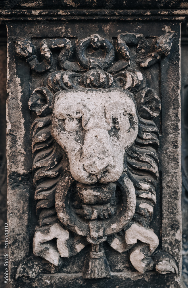 Fragment of the Boim chapel in Lviv, Ukraine. Old Renaissance architecture, reliefs and sculptures of lion, decorative details and elements close-up. Fragment of the Boim chapel in Lviv, Ukraine. Old Renaissance architecture, reliefs and sculptures of lion, decorative details and elements close-up.
