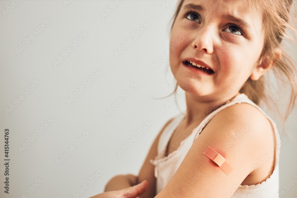 little-girl-feeling-pain-having-some-side-effects-after-vaccination