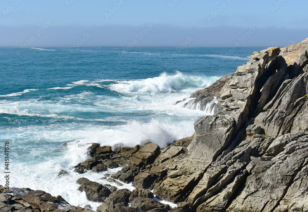 View from a cliff with waves breaking at famous Rias Baixas in Galicia Region. Spain.
