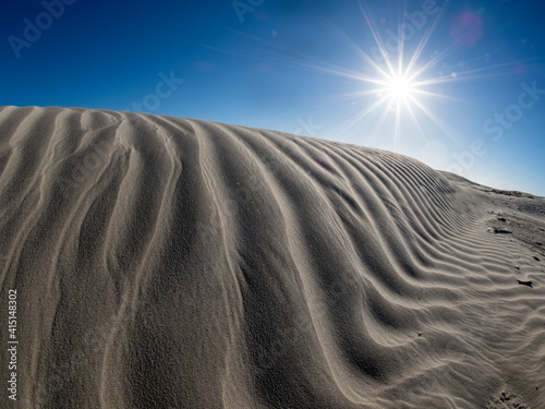 Wind swept barkhan sand dunes on the barrier island of Isla Magdalena, Baja California Sur