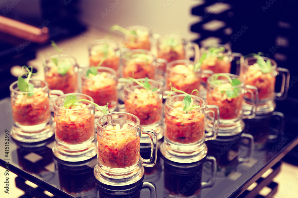 Eggplant appetizer in small glasses, toned