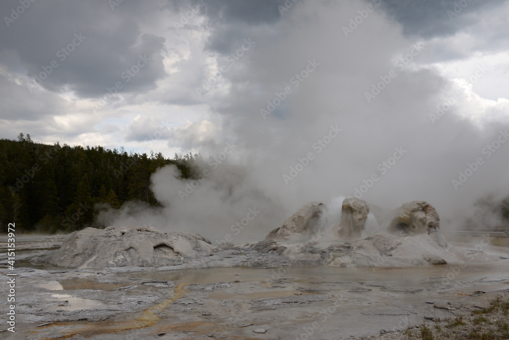 Giant Geyser at Old Faithful geothermal area in Yellowstone National Park, Wyoming, USA Giant Geyser at Old Faithful geothermal area in Yellowstone National Park, Wyoming, USA