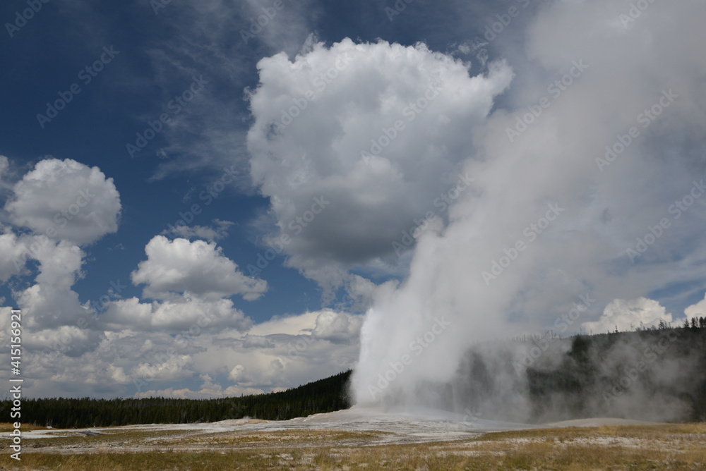 Old Faithful geyser in Yellowstone National Park, Wyoming, USA