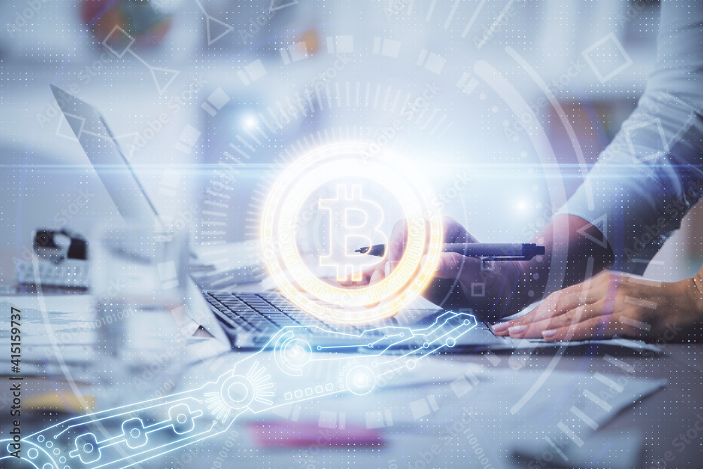 Double exposure of woman hands typing on computer and crypto market theme hologram drawing. Blockchain concept. Double exposure of woman hands typing on computer and crypto market theme hologram drawing. Blockchain concept.