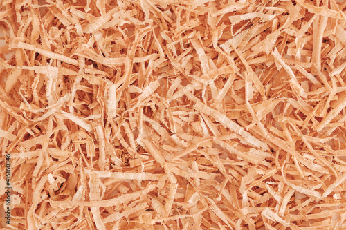 Wood shavings as background texture. Top view. Copy, empty space for text