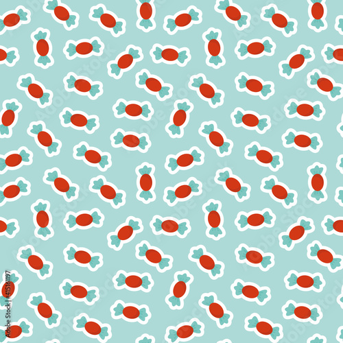 Christmas and New Year candy pattern on turquoise background.