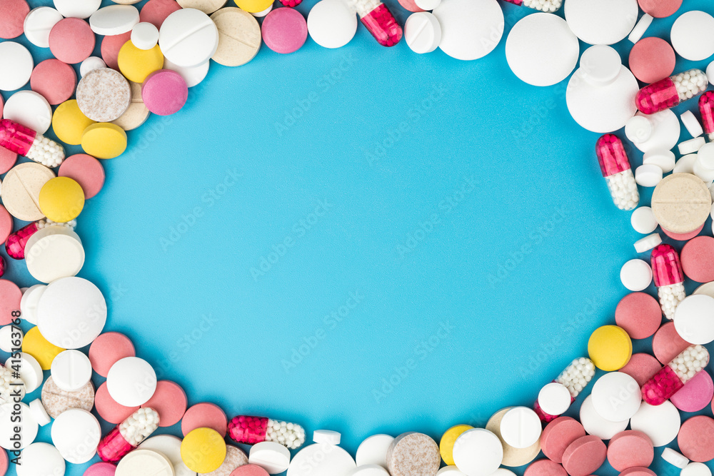 Background of assorted pharmaceutical capsules and medication in different colors. Background of assorted pharmaceutical capsules and medication in different colors.