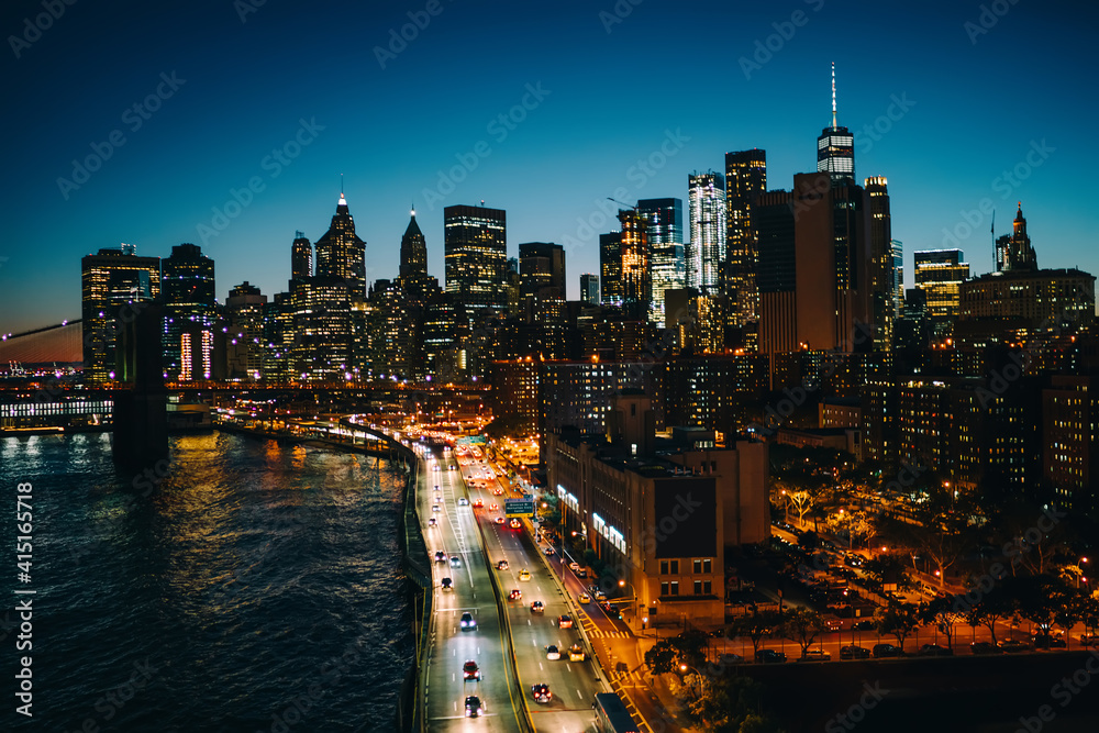 Cityscape of brightly lit New York skyscrapers