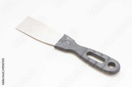 putty knife on white background. Apartment renovation tool