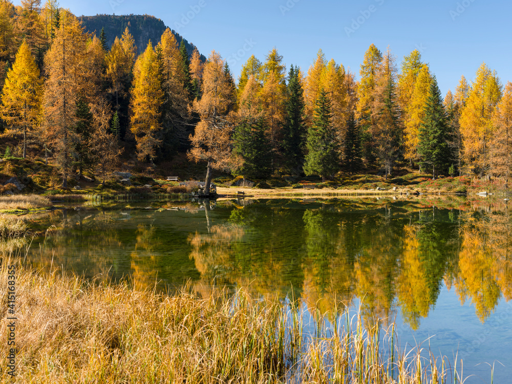 Lago San Pellegrino (Lech de San Pelegrin) during fall at Passo San Pellegrino in the Dolomites. Italy.