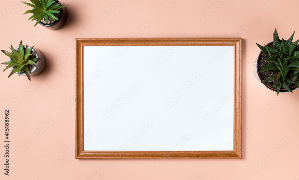 White card mockup with home plants on the pastel beige background. Concept of minimalism. Copy space. Workplace White card mockup with home plants on the pastel beige background. Concept of minimalism. Copy space. Workplace