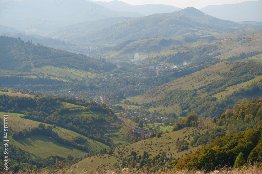 Panorama view of beautiful Carpathian mountains and village