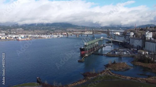 Aerial view of the bridge and ship near foodgrain terminal in Canada photo