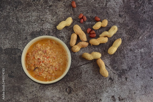 Peanut sauce or Bumbu Kacang, made from ground roasted or fried peanuts with chili, garlic, soy sauce, tamarind and spices
