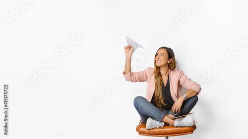 a bussines woman with the paper airplane on the isolated white background
