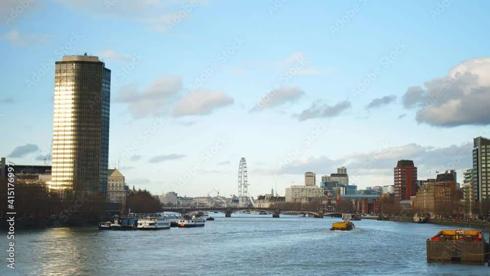 4K Hyperlapse of active life in the Central London, River Thames, Westminster. Timelapse of the traffic and residential and commercial buildings in the heart of London, England, UK. 4K Hyperlapse of active life in the Central London, River Thames, Westminster. Timelapse of the traffic and residential and commercial buildings in the heart of London, England, UK.