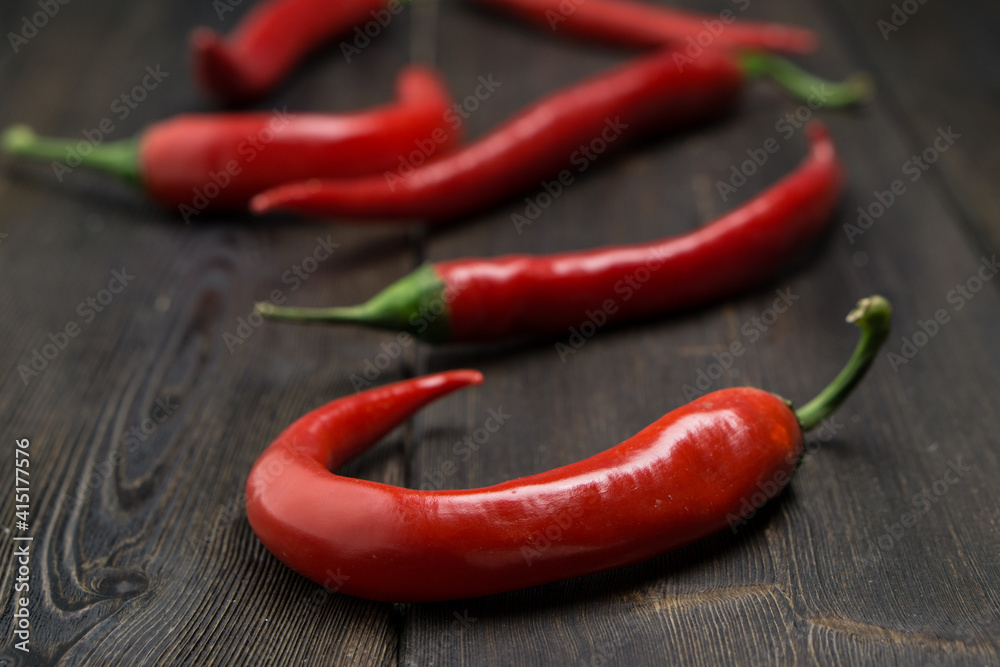 hot chili peppers red wooden table cooking food ingredients