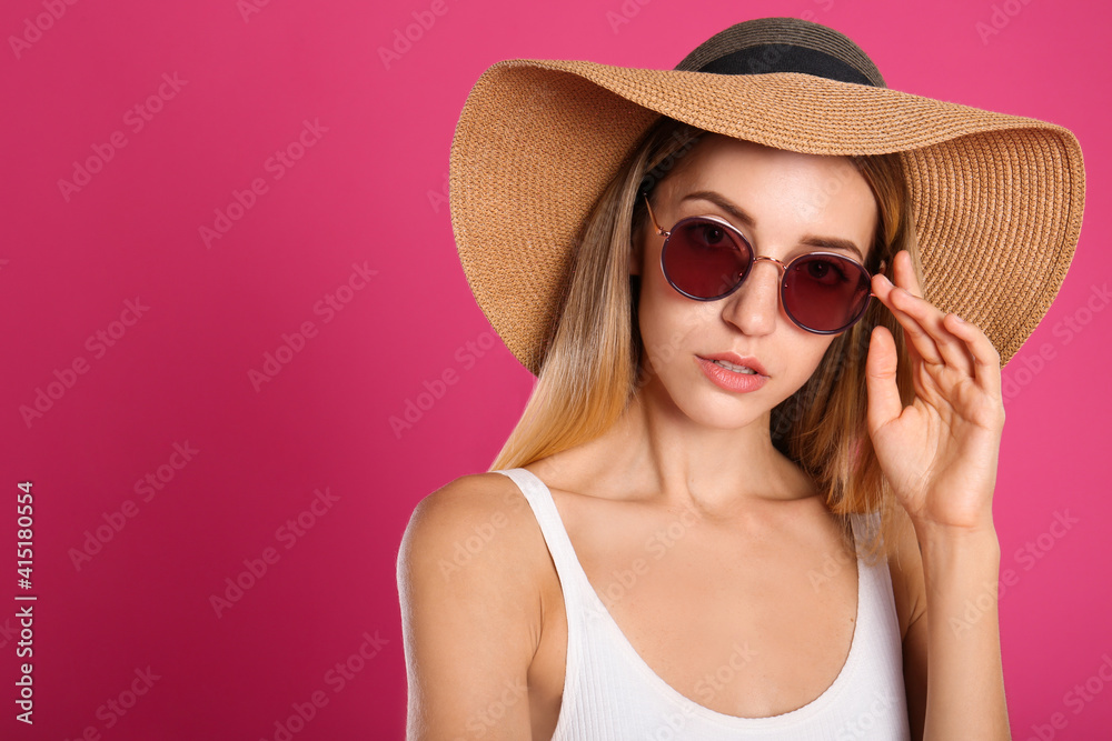 Beautiful woman in stylish sunglasses on pink background. Space for text Beautiful woman in stylish sunglasses on pink background. Space for text