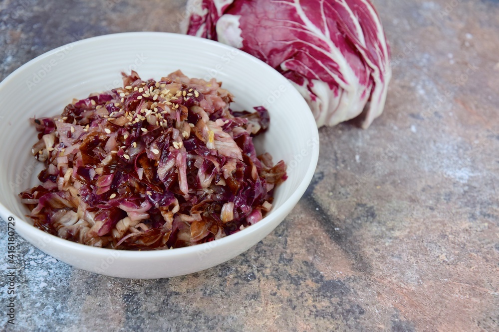 Sautéed Radicchio with Sesame Seeds in a Bowl Sautéed Radicchio with Sesame Seeds in a Bowl