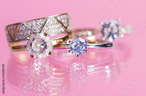 Rings on a pink background.