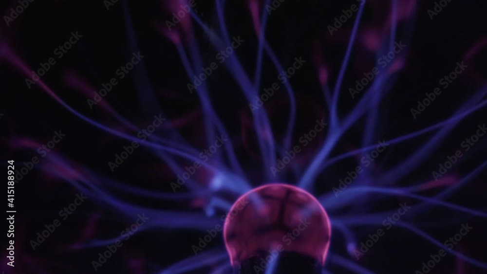 Electric plasma ball lamp. Tesla Coil experiment with electricity, plasma lamp close-up.