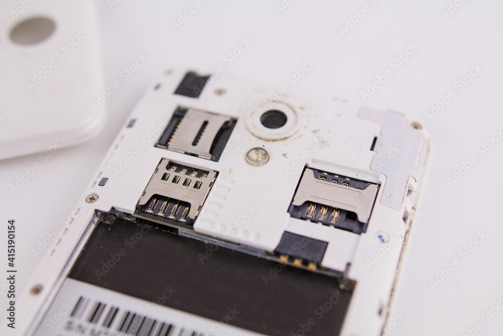 smartphone with removed cover and battery on white background phone repair smartphone with removed cover and battery on white background phone repair