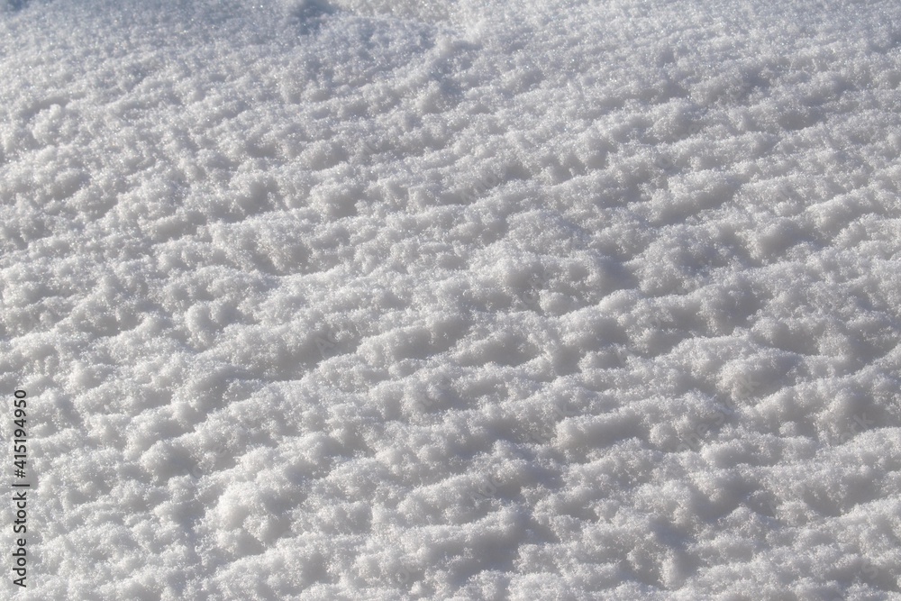 Snow texture. Winter background. Daylight. Snow crystals Snow texture. Winter background. Daylight. Snow crystals