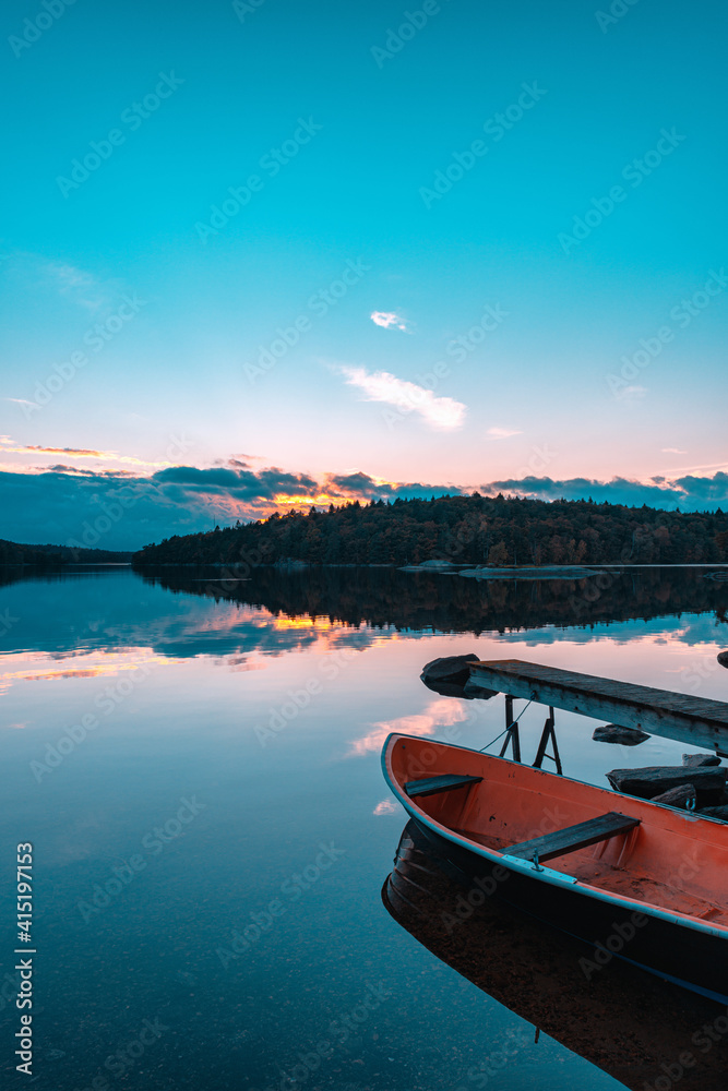 Sunset lake boat
