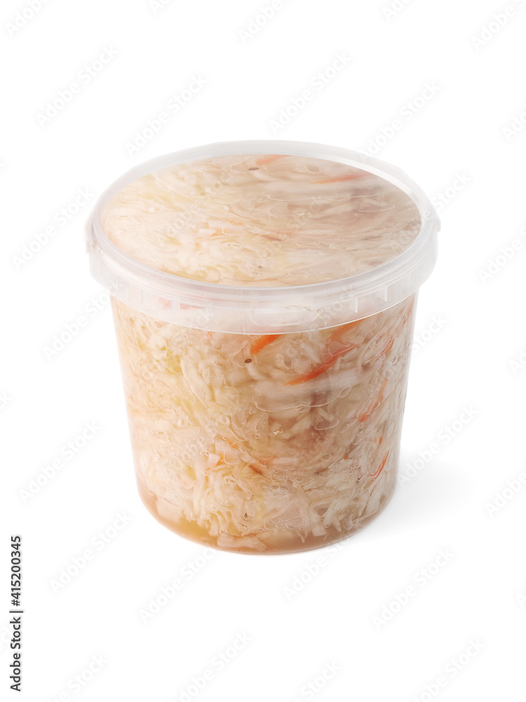 clean plastic packaging, transparent bucket with sauerkraut (fermented