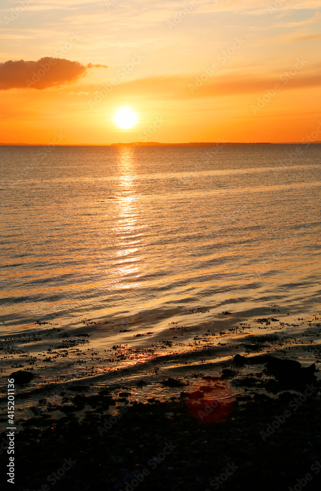 Bottles at the beach in Sunrise, Samso, Denmark, Europe Bottles at the beach in Sunrise, Samso, Denmark, Europe