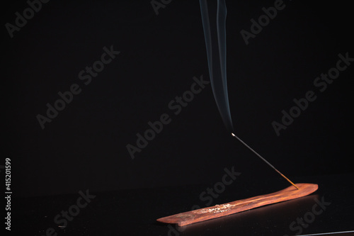 Incense burning giving of different patterns of smoke
