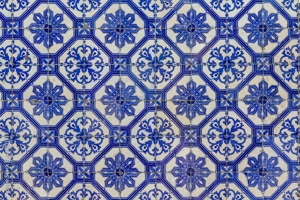 beautiful blue and white pattern hand painted on traditional portuguese azulejo tiles texture background