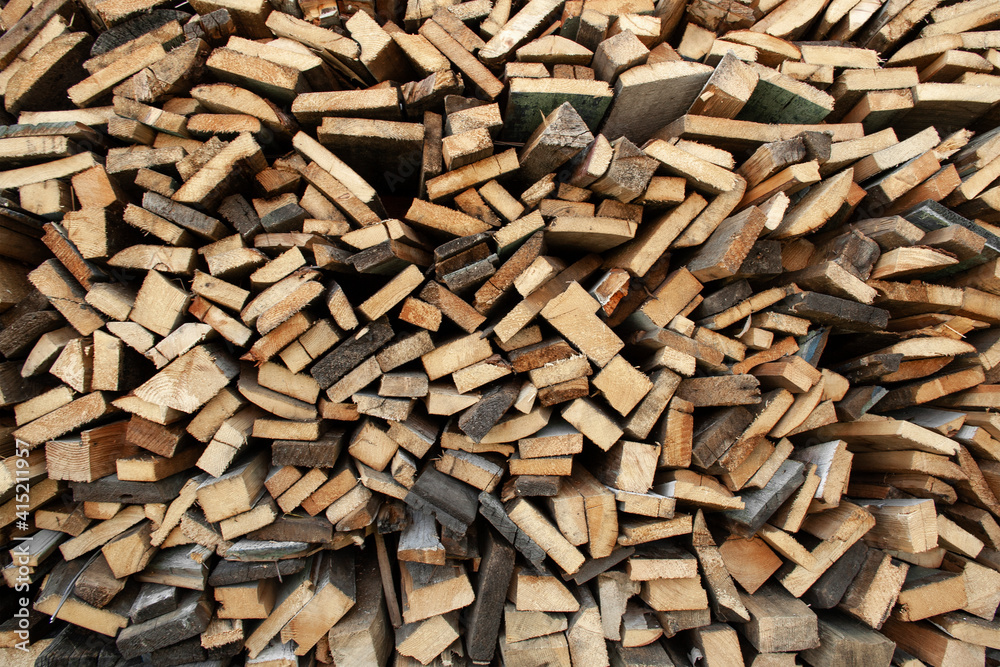 Wood Inside Sawmill. Wide banner or panorama wooden trunks. Sawmill.Natural sawn wood. The texture of the cut. Arranged boards in a sawmill. Harvesting firewood in the village. Pile of planks Wood Inside Sawmill. Wide banner or panorama wooden trunks. Sawmill.Natural sawn wood. The texture of the cut. Arranged boards in a sawmill. Harvesting firewood in the village. Pile of planks