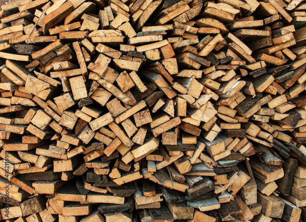 Wood Inside Sawmill. Wide banner or panorama wooden trunks. Sawmill.Natural sawn wood. The texture of the cut. Arranged boards in a sawmill. Harvesting firewood in the village. Pile of planks Wood Inside Sawmill. Wide banner or panorama wooden trunks. Sawmill.Natural sawn wood. The texture of the cut. Arranged boards in a sawmill. Harvesting firewood in the village. Pile of planks