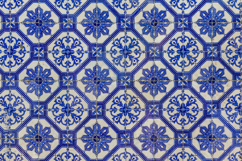 beautiful blue and white pattern hand painted on traditional portuguese azulejo tiles texture background