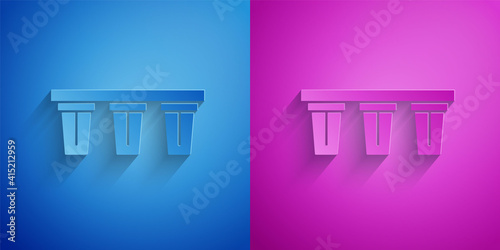 Paper cut Water filter icon isolated on blue and purple background. System for filtration of water. Reverse osmosis system. Paper art style. Vector.